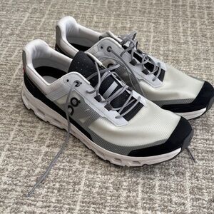 On Running Gray and Black Athletic Shoes